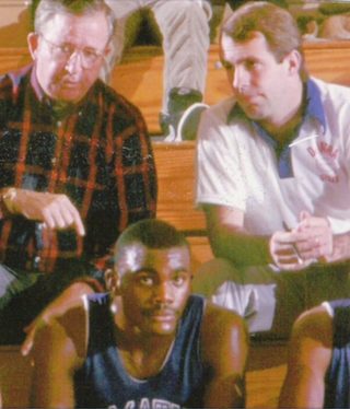 Brey listens to Wootten. Photo credit: DeMatha Catholic High School